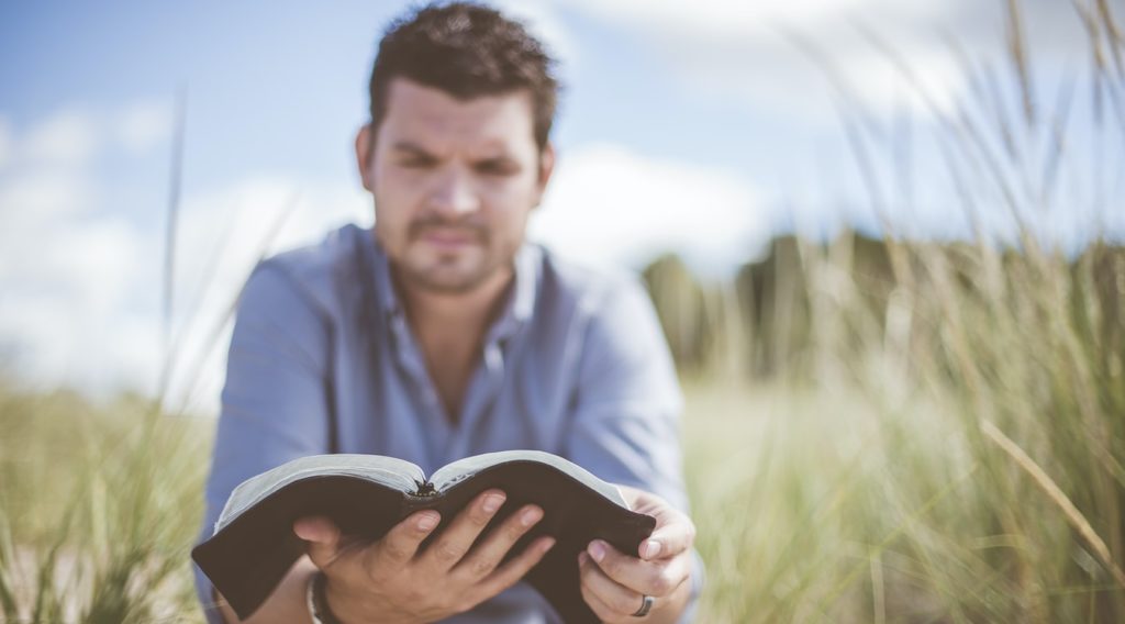 Biblical Counseling - man reading a Bible